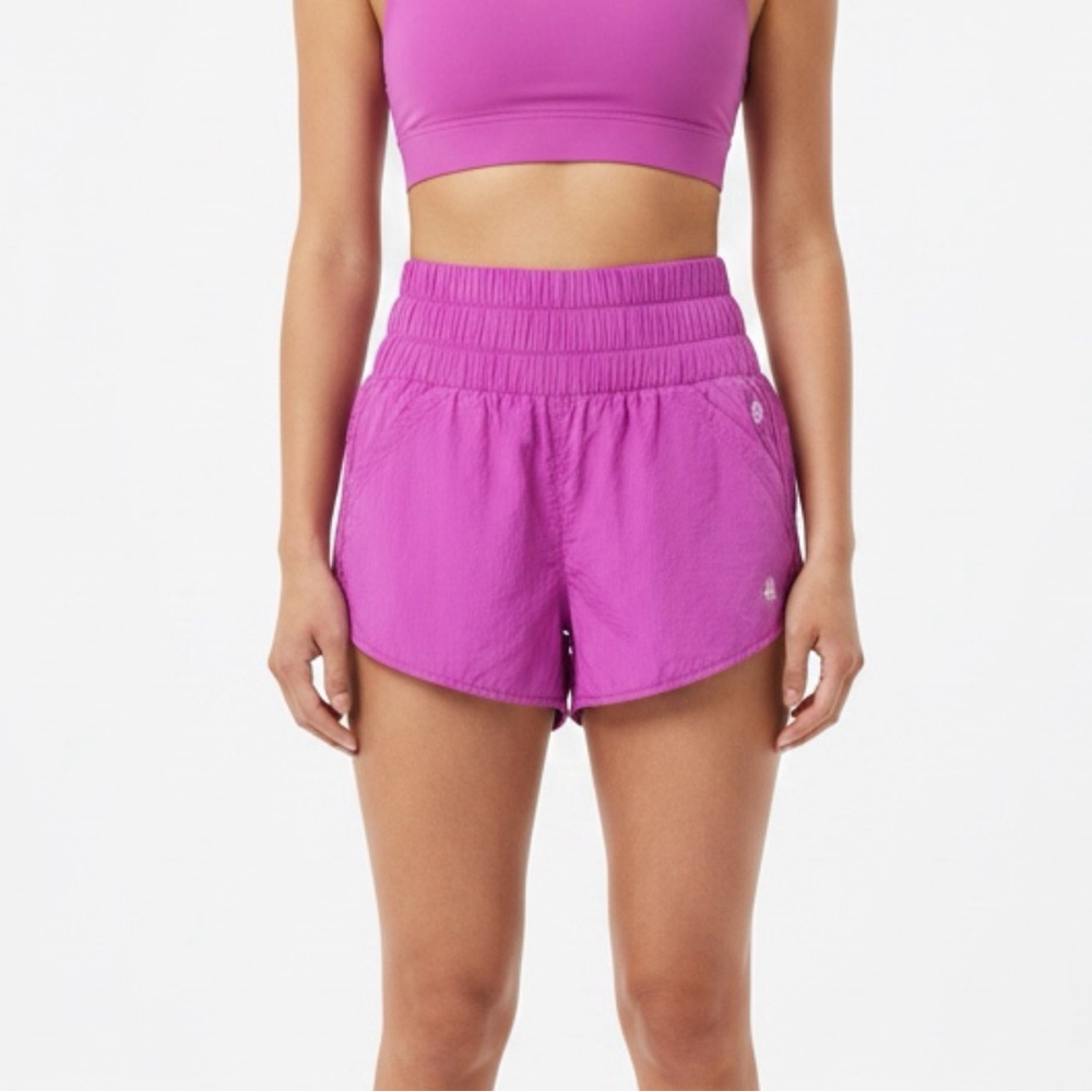 Free People Performance High-Rise Athletic Shorts in Vivid Pink